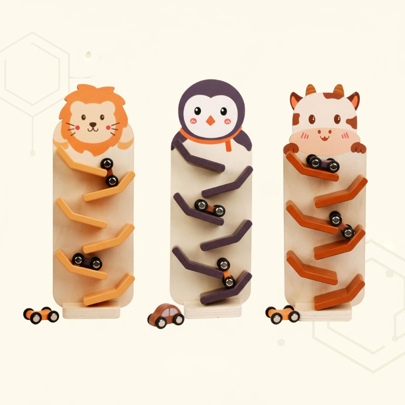 Lion, penguin, and cow car ramps displayed side by side with wooden cars