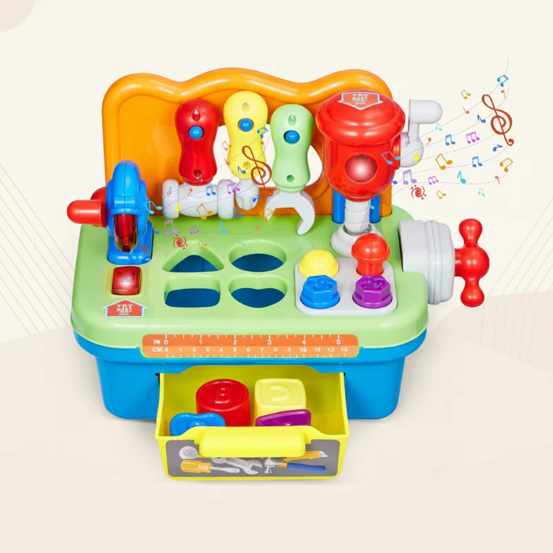 Colorful musical workbench with pretend tools, shape-sorting openings and a pull-out storage drawer