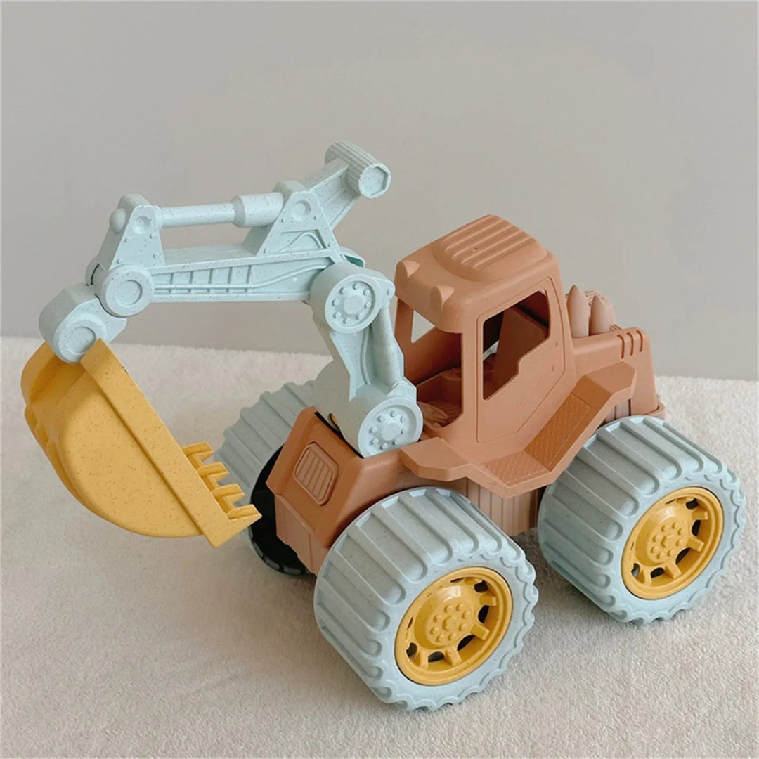 Toy excavator with a tan cab, gray wheels, and yellow digging bucket