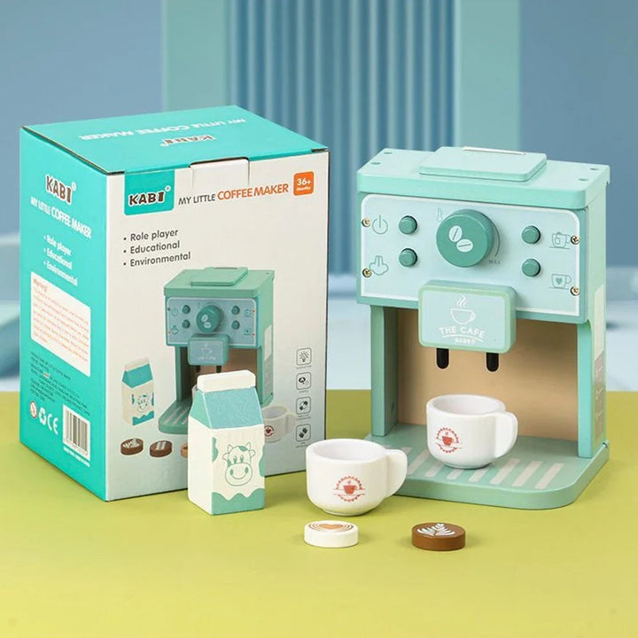 Mint green wooden coffee play set with two cups, a toy milk carton, wooden discs and retail box