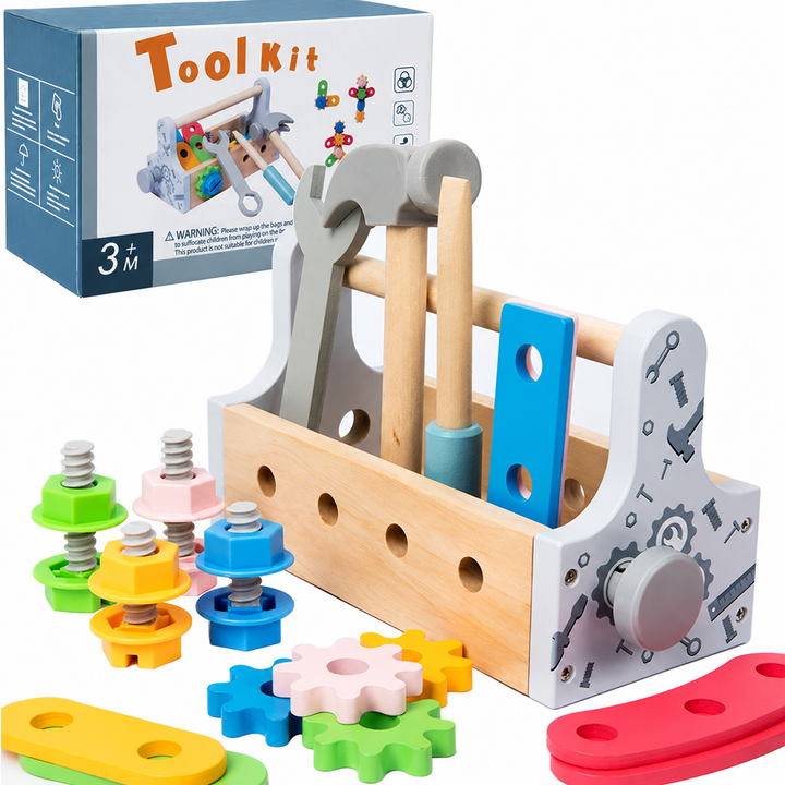 Wooden toolbox with a hammer, screwdriver, wrench, colorful gears, and building pieces beside the packaging.