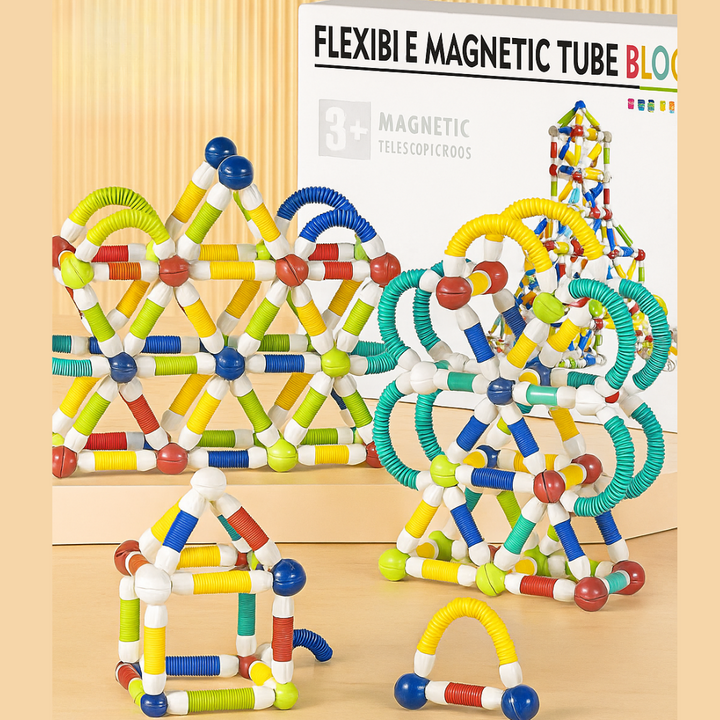 84-piece magnetic building set displayed as tall geometric structures beside its box