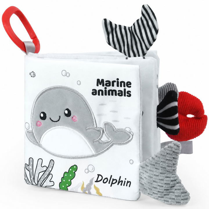 Sea creature fabric book with a dolphin cover, striped fabric tail and red hanging loop