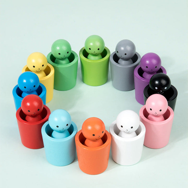 Wooden figures in matching colored cups arranged in a circle