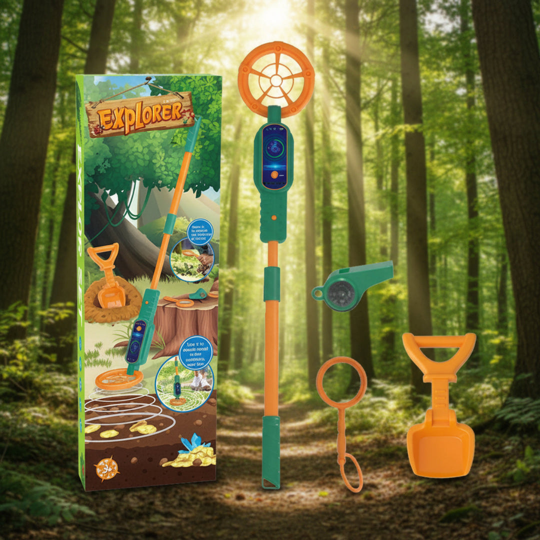 Green and orange kids' metal detector with a shovel, magnifying glass, compass, and retail box