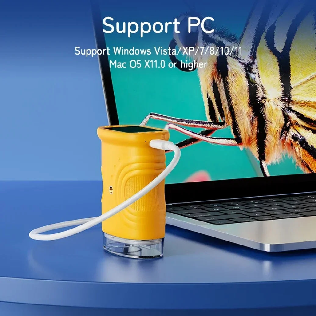 Yellow digital microscope connected by USB cable to a laptop displaying an insect close-up