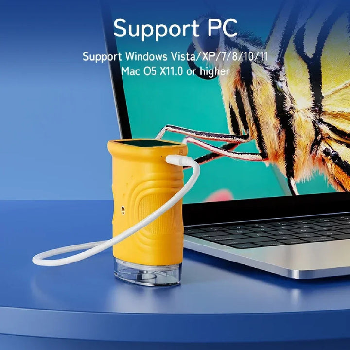 Yellow digital microscope connected by USB cable to a laptop displaying an insect close-up