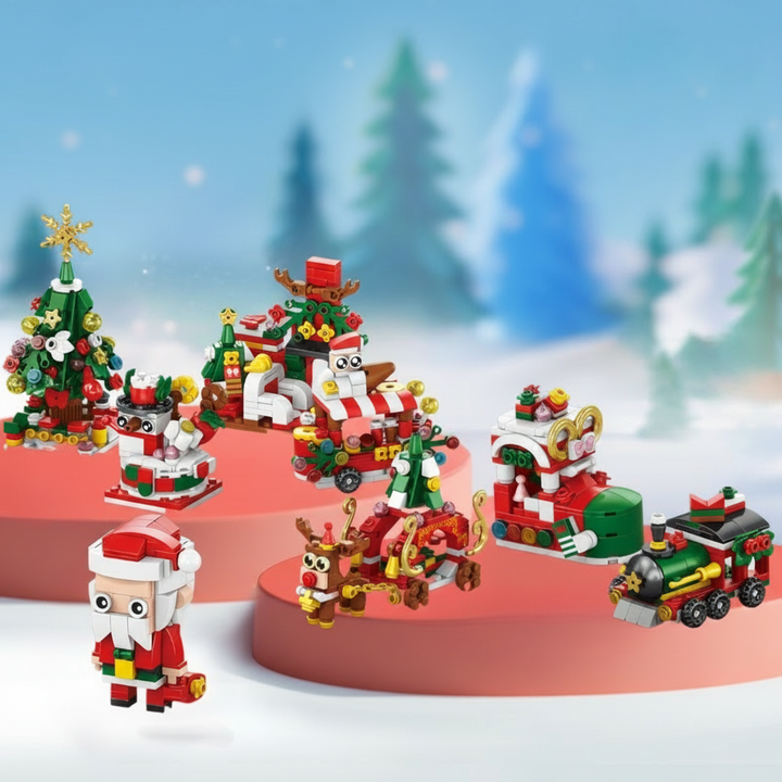 Eight Christmas building models arranged on red display platforms in a snowy scene