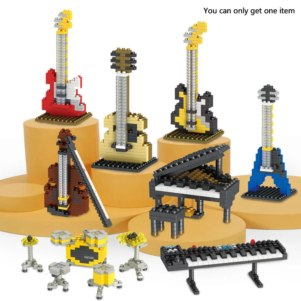 Miniature instrument block models showing guitars, a violin, a piano, a keyboard, and drums