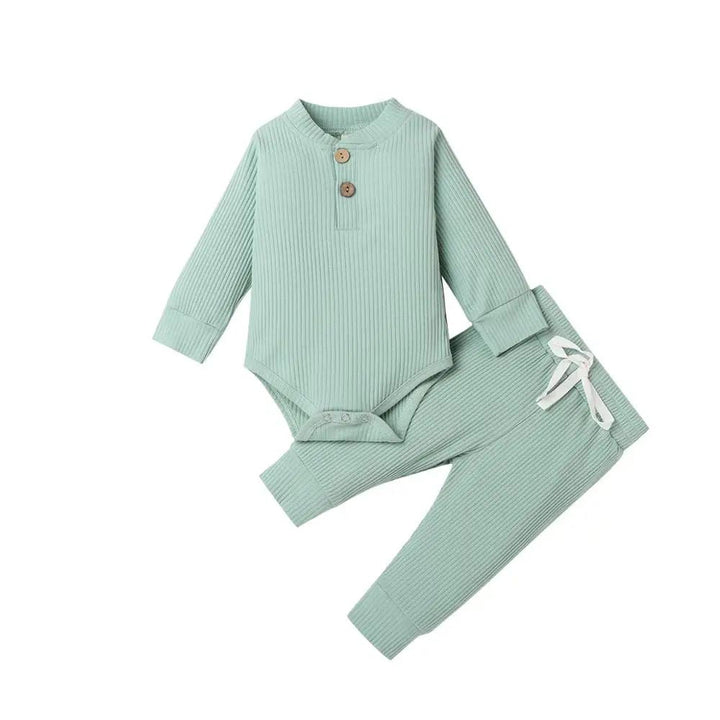 Mint green ribbed baby bodysuit and matching pants with neckline buttons