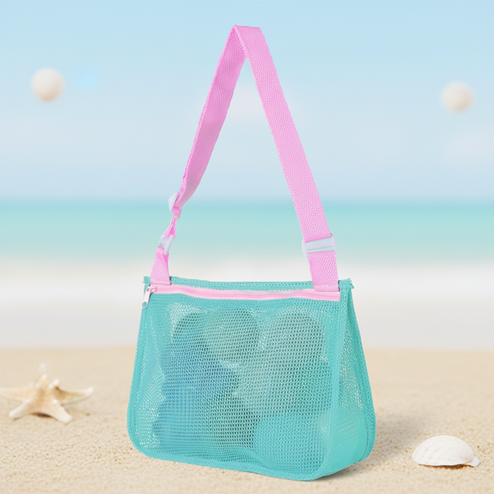 Mint mesh beach bag with pink trim and an adjustable pink shoulder strap