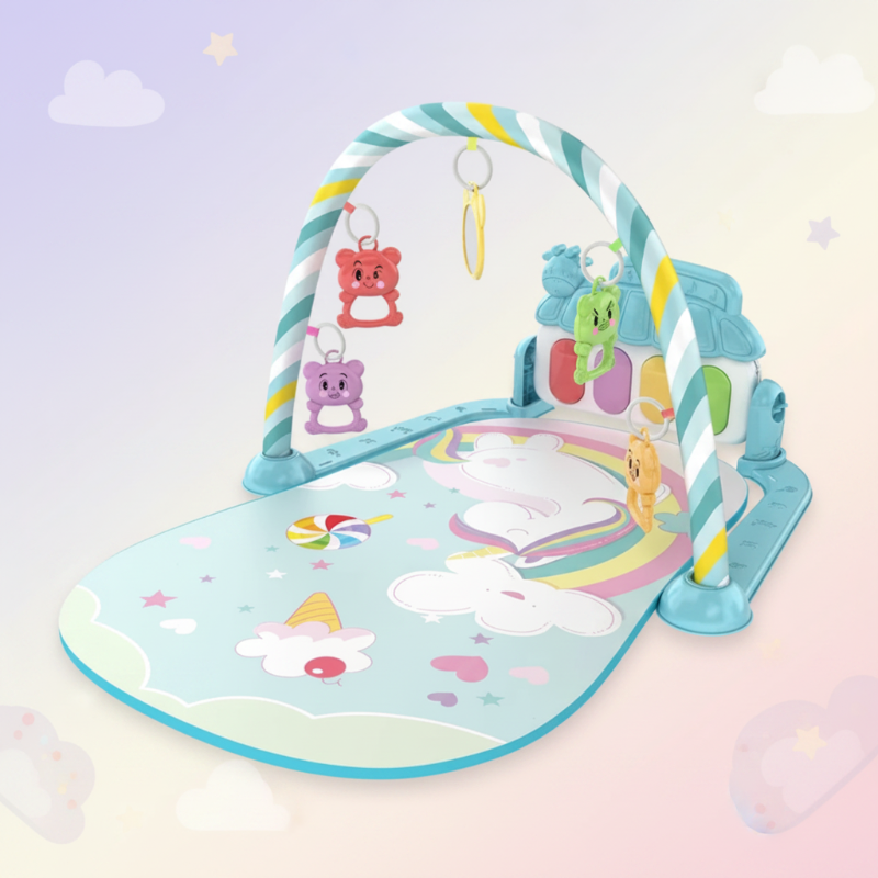 Mint baby play gym with a pastel rainbow-and-unicorn mat and a striped arch