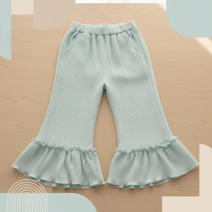 Pale green wide-leg pants with an elastic waistband and ruffled hems