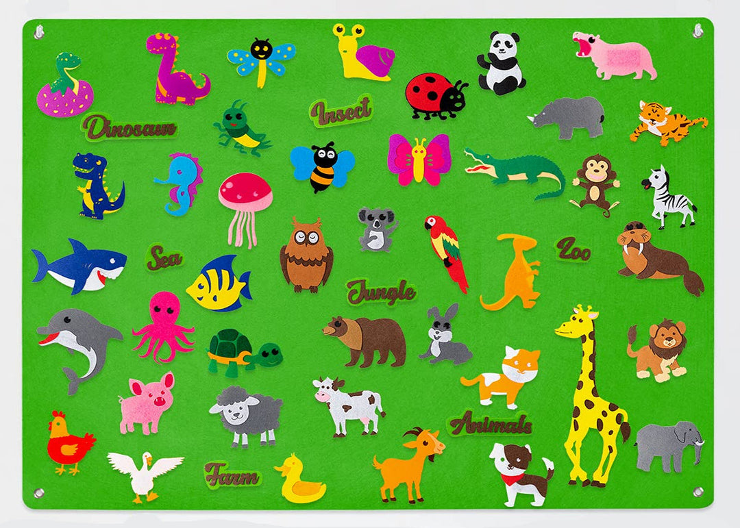 Green felt board filled with dinosaur, insect, sea, jungle, farm, and zoo animal pieces