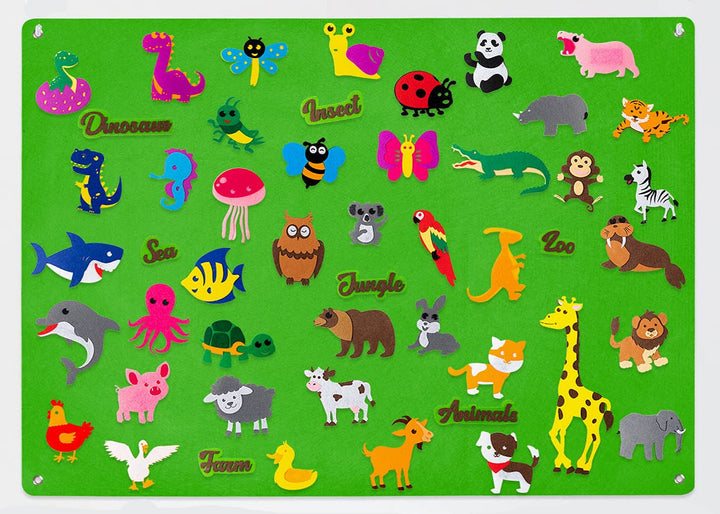 Green felt board filled with dinosaur, insect, sea, jungle, farm, and zoo animal pieces