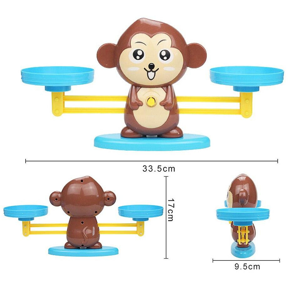 Monkey balance scale measurements: 33.5 cm wide, 17 cm tall, and 9.5 cm deep