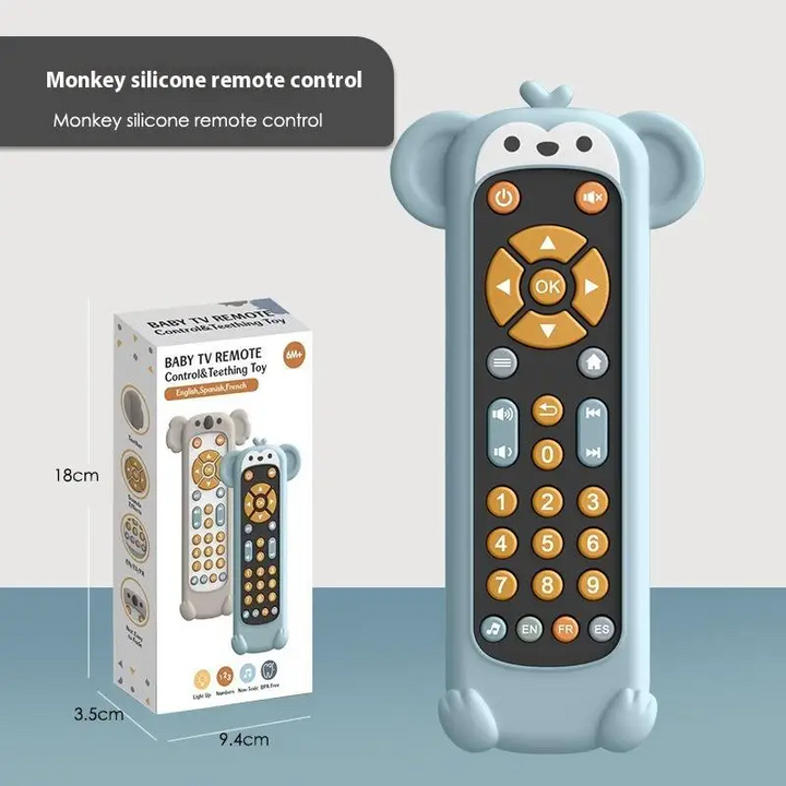 Blue monkey toy remote beside its retail box