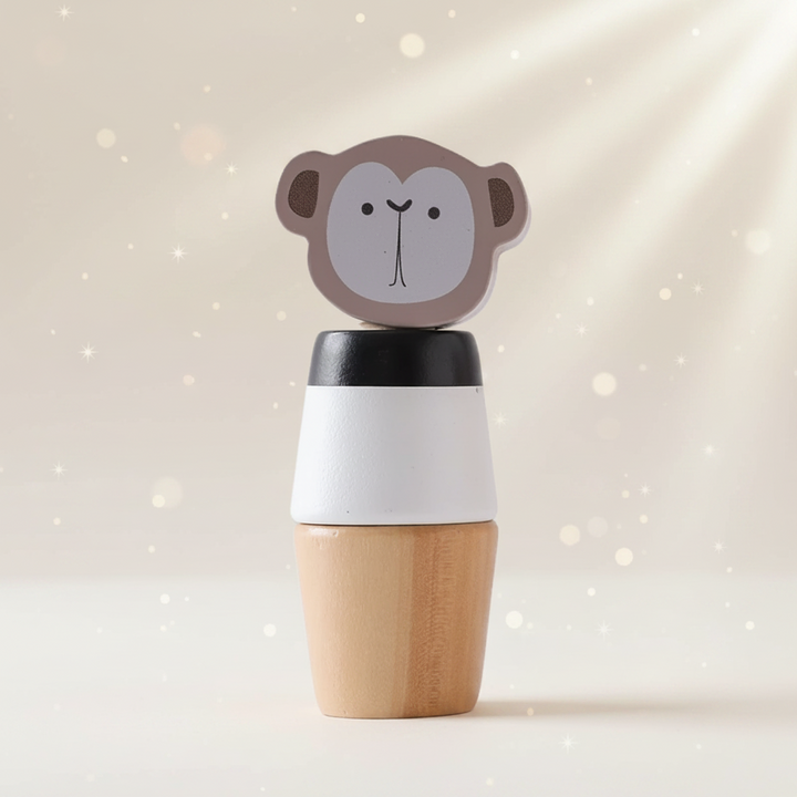 Monkey wooden stacking toy with a gray face and black-and-white body section