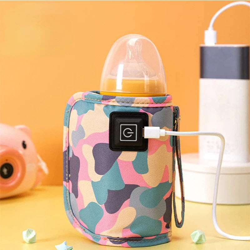 Multicolor camouflage baby bottle warmer connected to a power bank.
