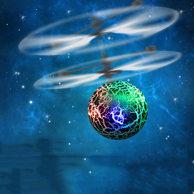 Multicolor flying ball shown with white rotor motion trails on a blue background