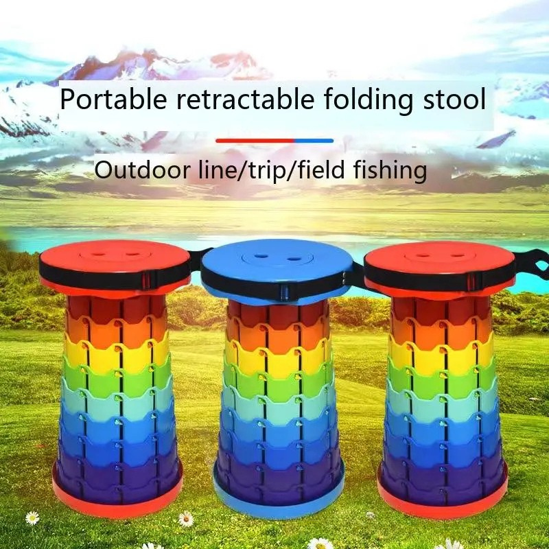 Three rainbow telescoping stools with red or blue seats against an outdoor landscape