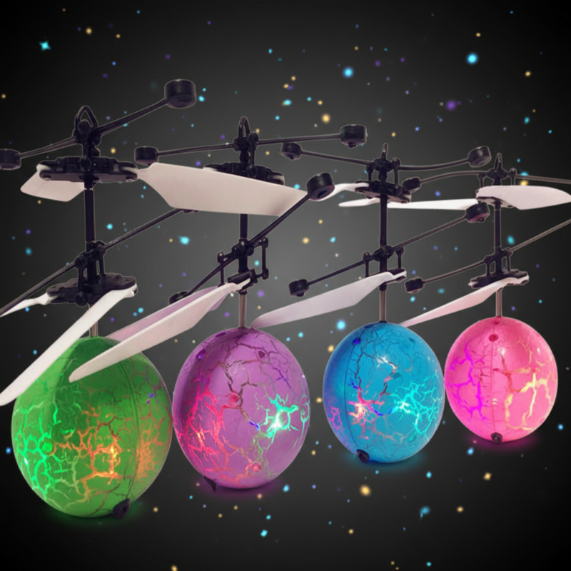 LED flying-ball toys in green, purple, blue, and pink with white rotor blades