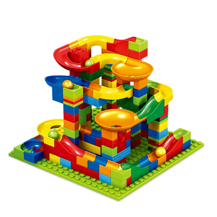 Multicolor block marble run with curved tracks, orange funnels, and a green baseplate