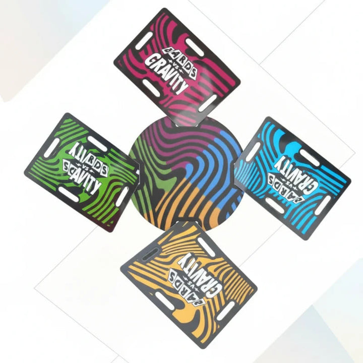Four colorful slotted cards extending from a round, multicolored balancing platform.