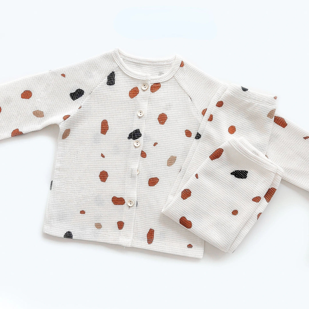 White button-front pajama set with multicolored speckles