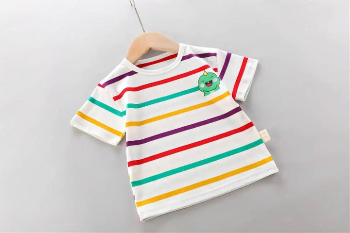 White short-sleeve shirt with multicolor stripes and a small green dinosaur chest detail