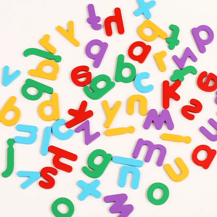 Loose wooden alphabet letters in bright red, yellow, green, blue, and purple