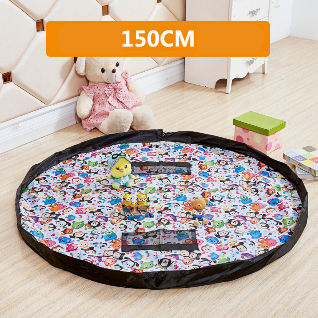 Multicolored character-print play mat opened flat with toys in the center.