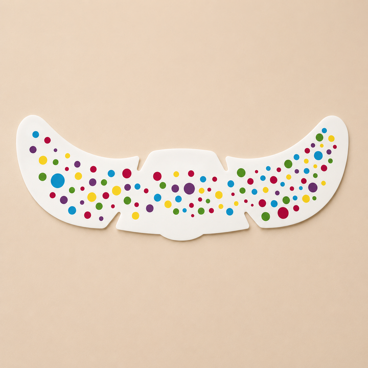 Curved face sticker sheet covered with bright multicolored dots