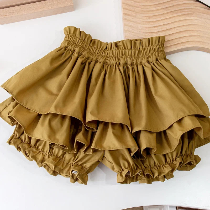 Close-up of the mustard skirt&