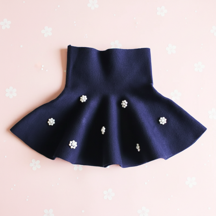 Navy blue A-line knit skirt with flower-shaped bead accents