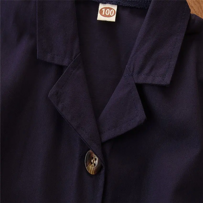 Close-up of the navy romper&