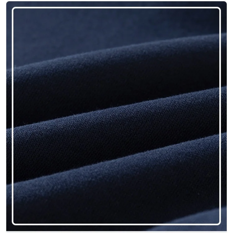 Close-up of folded navy sweatshirt fabric showing its texture