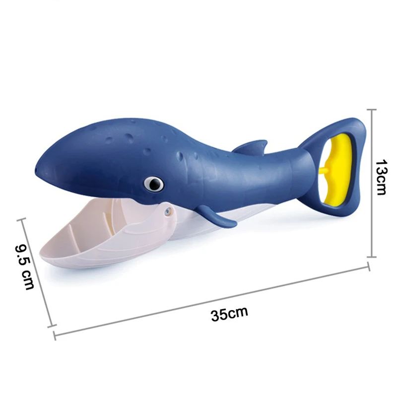 Navy whale-shaped sand grabber measuring 35 x 13 x 9.5 cm