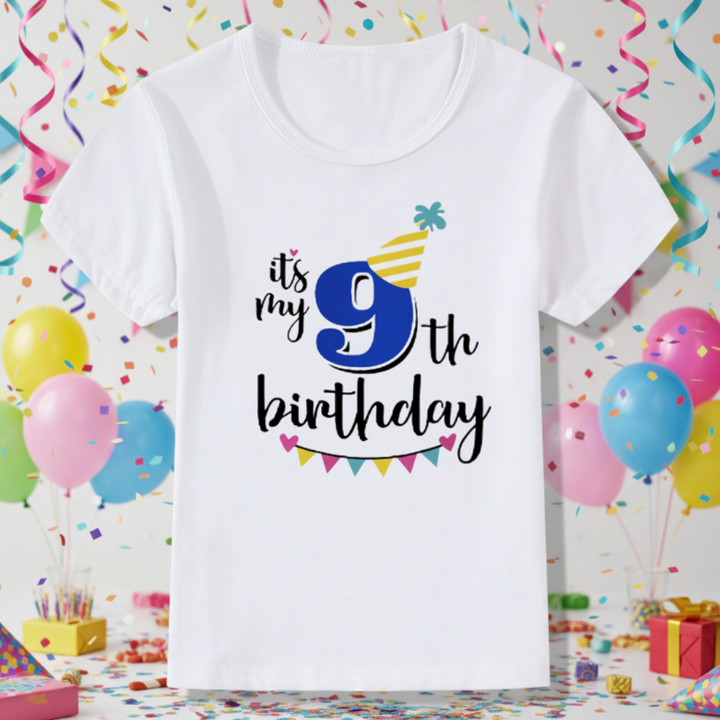 White ninth-birthday T-shirt with a blue number 9, yellow party hat, and colorful bunting
