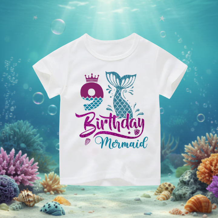 White ninth-birthday T-shirt with a purple number 9, crown, and teal mermaid tail
