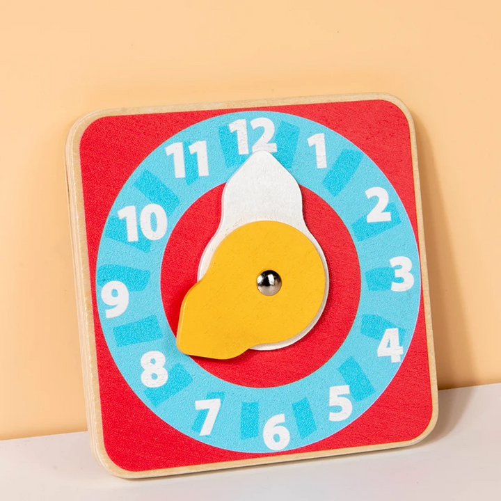 Wooden learning clock board with white numbers and two movable hands.