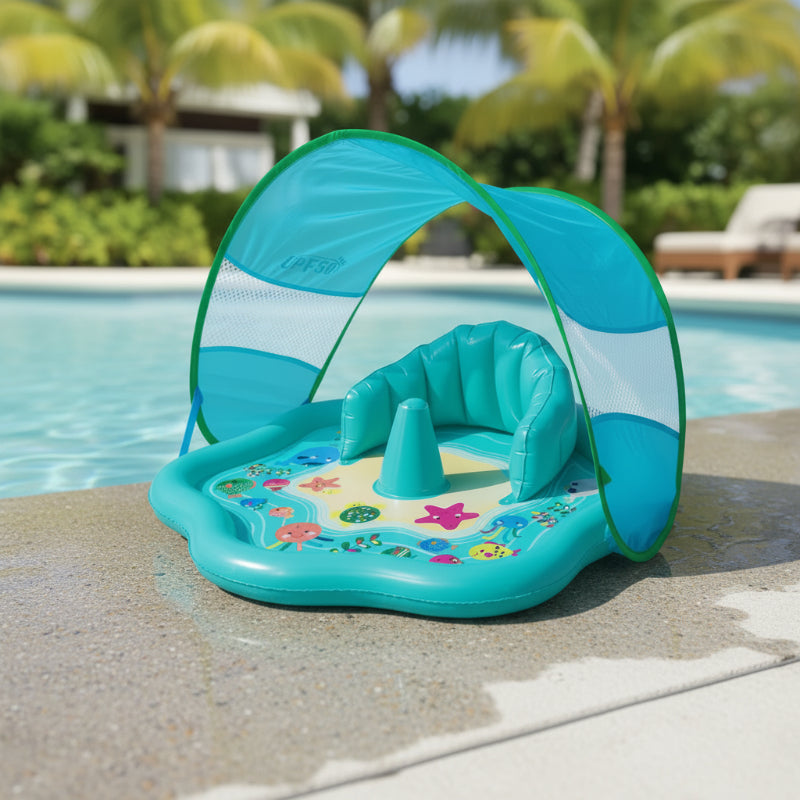 Turquoise baby pool with an ocean-print floor, inflatable backrest and arched sunshade beside a swimming pool