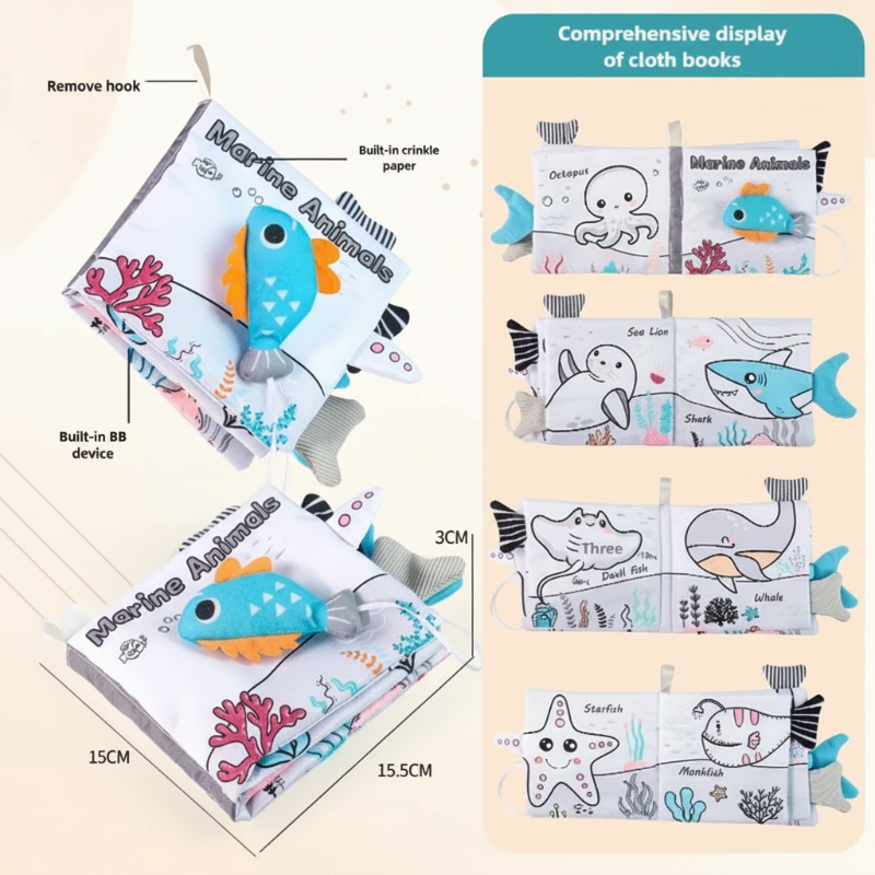 Ocean cloth book with a raised fish detail, attachment hook, and illustrated sea creature pages