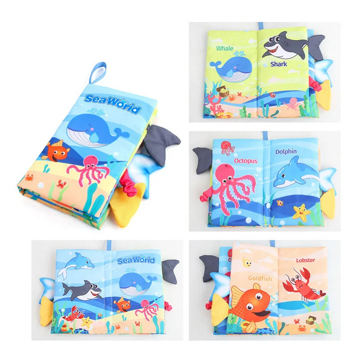 Ocean animal fabric book with whale, shark, octopus, and dolphin illustrations and fabric fins.