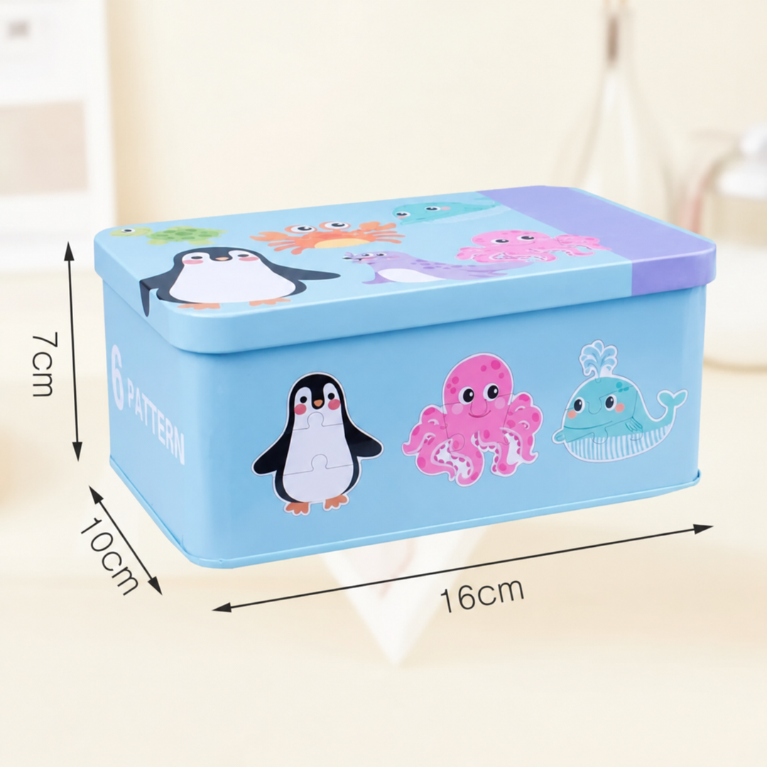 Ocean puzzle storage tin measuring 16 cm long, 10 cm wide, and 7 cm tall