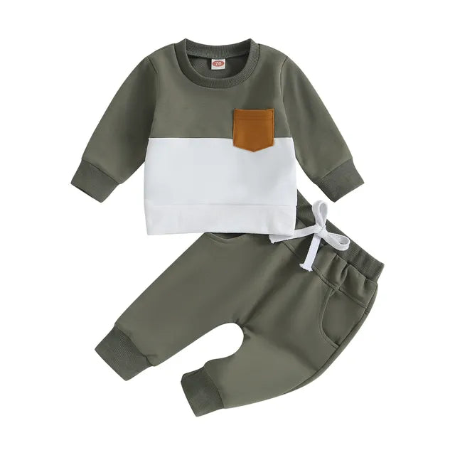 Olive green and white sweatshirt with a tan pocket and olive drawstring joggers