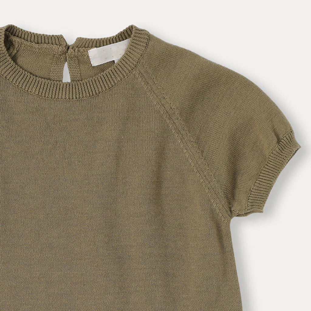Olive knit dress top with a ribbed neckline, raglan sleeves, and ribbed cuffs.