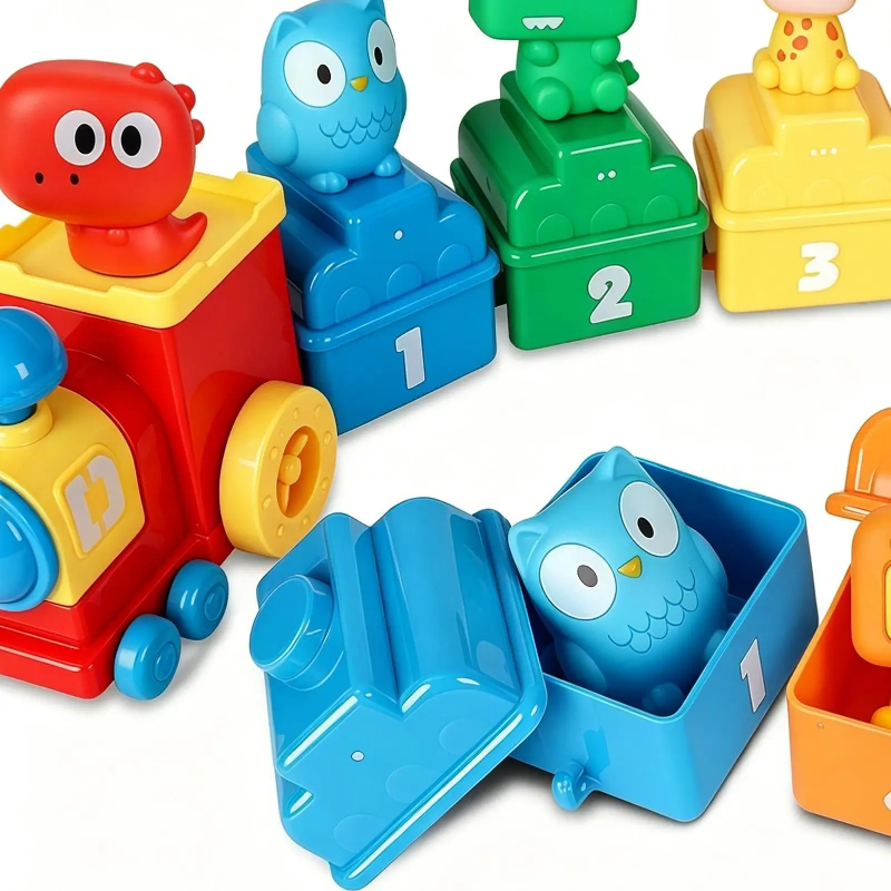 Blue numbered wagon open beside an animal train, with an owl figure inside