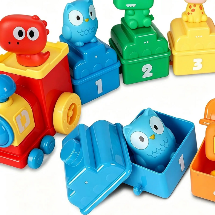 Blue numbered wagon open beside an animal train, with an owl figure inside