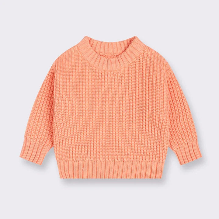 Orange cotton knit sweater with a round neckline, long sleeves, and ribbed cuffs and hem.